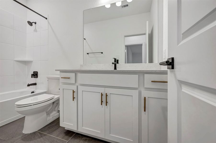 Furnished interior view inside a new home in The Grand Prairie 50’, Hockley (Image 14).