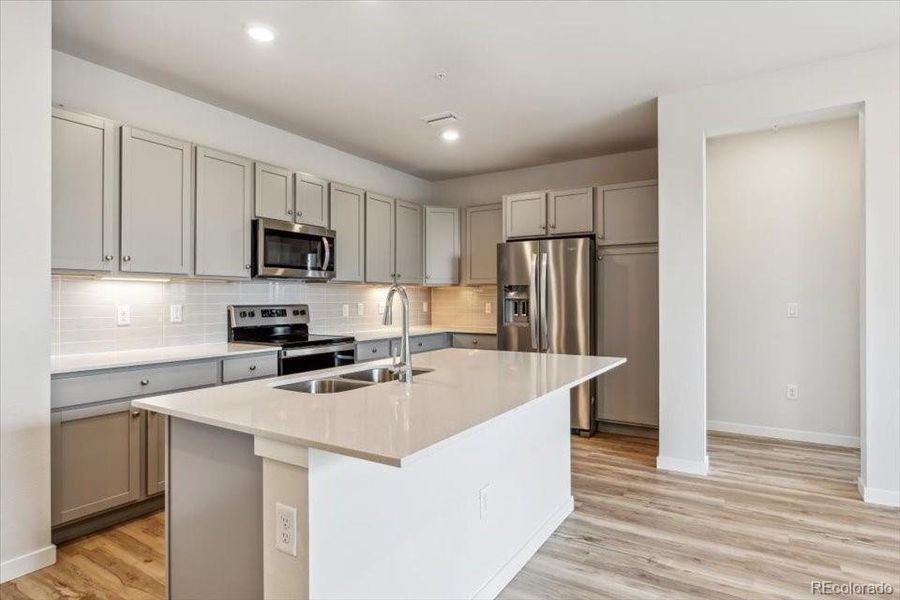 Furnished interior view inside a new home in Condo Collection at Grand Vue at Interlocken, Broomfield (Image 4). Furnished interior view inside a new home in Condo Collection at Grand Vue at Interlocken, Broomfield (Image 4).