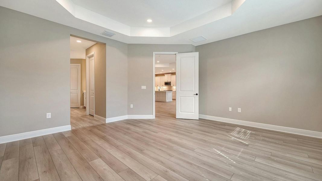 Spacious, unfurnished interior of a new home in Windward Real Estate and Homes for Sale in Sarasota, FL - Neal Communities, Lakewood Ranch (Image 32).