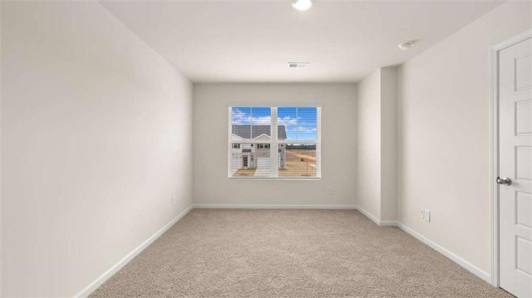Spacious, unfurnished interior of a new home in Young's Crossing, Stone Mountain (Image 13).