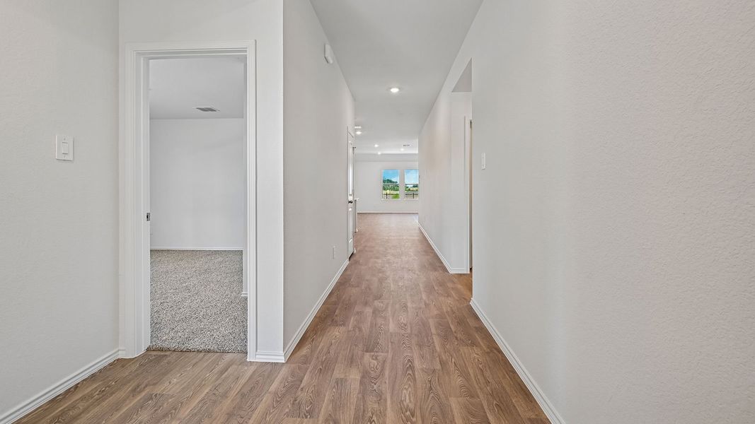 Spacious, unfurnished interior of a new home in Watermill, Uhland (Image 11).