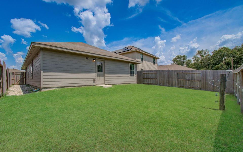 Front exterior of a new home in Tavola: Cottage Collection, New Caney, TX, highlighting curb appeal (Image 21).