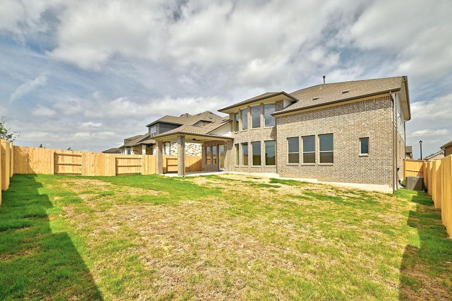 Exterior details and patio area of a home in Flora - 60', Hutto (Image 22).