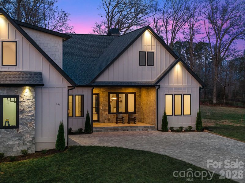 Exterior details and patio area of a home in , Fletcher (Image 31).