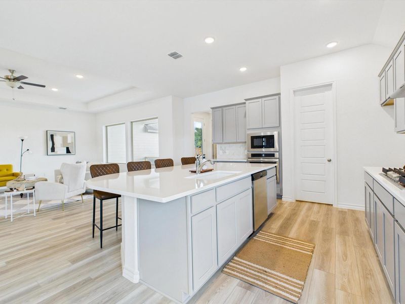 Furnished interior view inside a new home in Potranco Oaks, Castroville (Image 16).