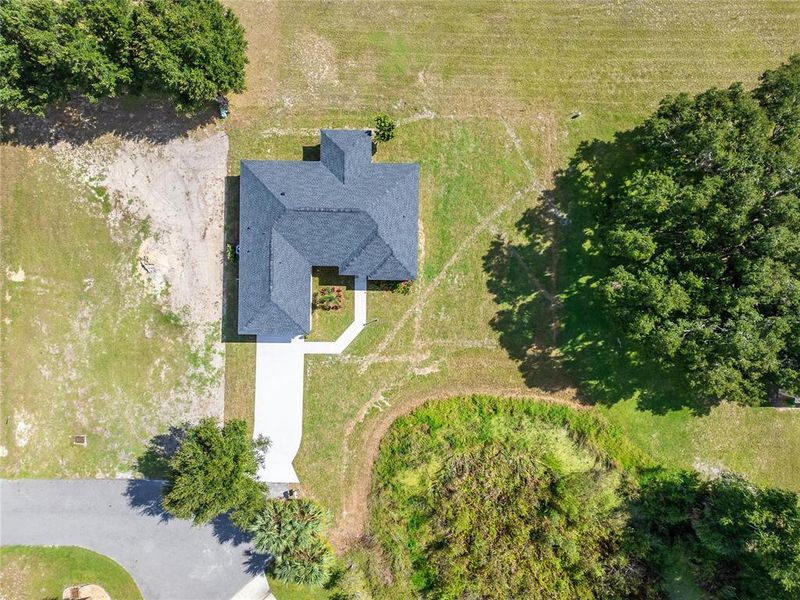 Front exterior of a new home in , Dade City, FL, highlighting curb appeal (Image 26). Front exterior of a new home in , Dade City, FL, highlighting curb appeal (Image 26).