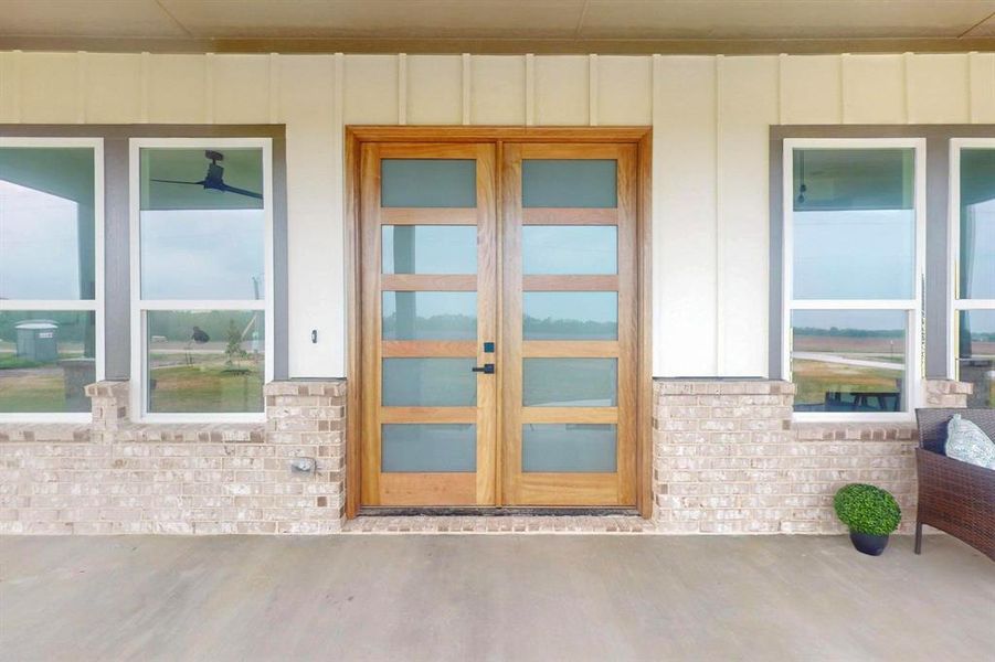 Property entrance featuring french doors Property entrance featuring french doors