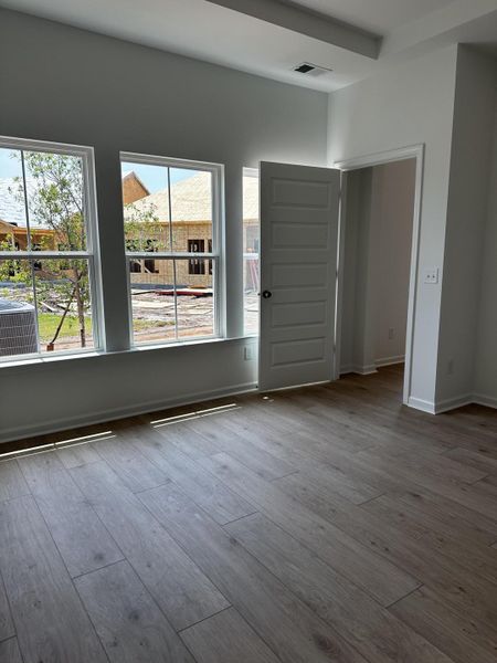 Spacious, unfurnished interior of a new home in Horizons at Carnes Crossroads | 55+: Legends Collection, Summerville (Image 14). Spacious, unfurnished interior of a new home in Horizons at Carnes Crossroads | 55+: Legends Collection, Summerville (Image 14).