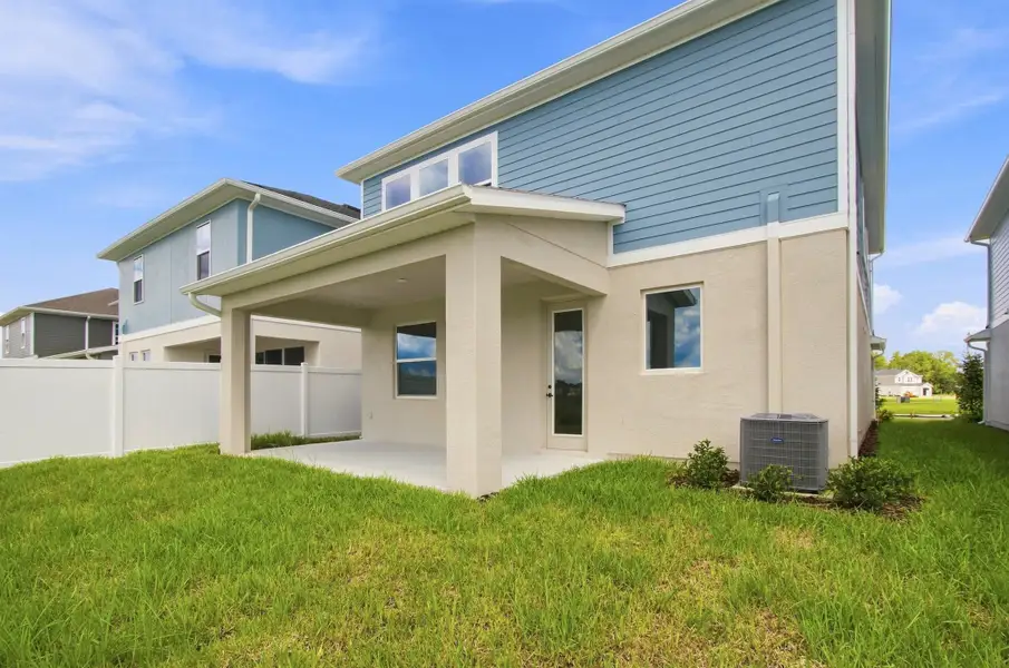 Exterior details and patio area of a home in Persimmon Place – Garden Series, Wesley Chapel (Image 3).