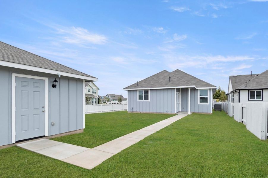Exterior details and patio area of a home in Casetta Ranch, Kyle (Image 4).