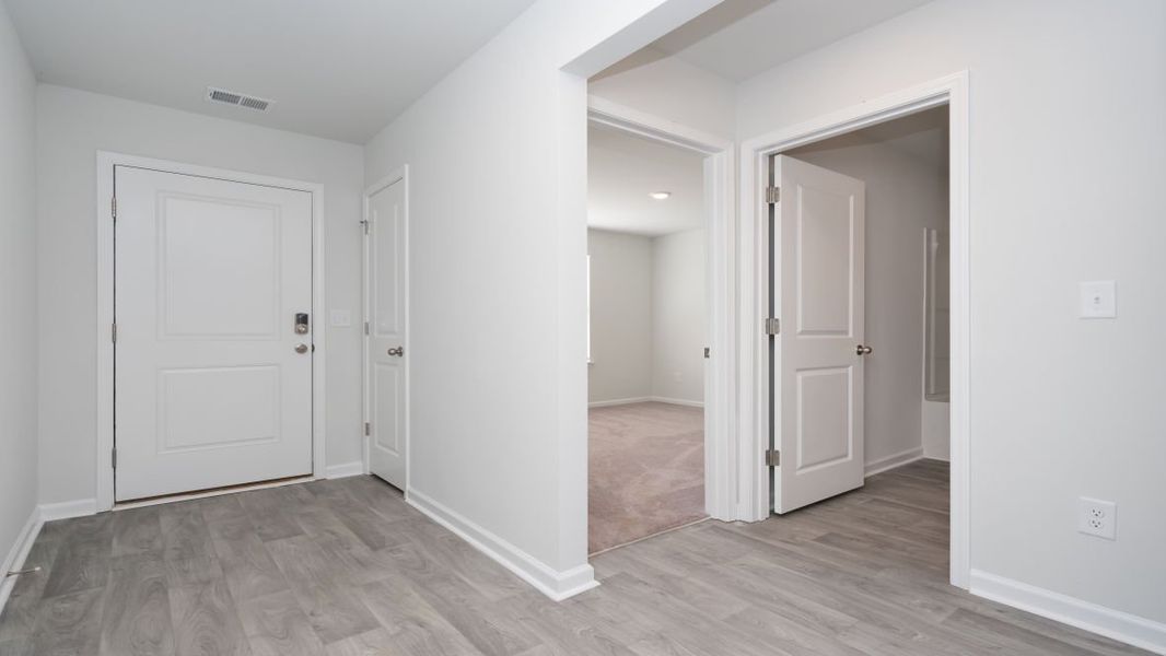 Representative unfurnished interior of a home built from the CALI by D.R. Horton in Jordanville Farms, Galivants Ferry (Image 14).