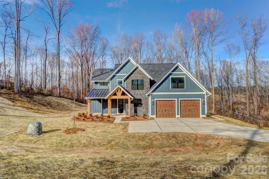 Front exterior of a new home in , Bessemer City, NC, highlighting curb appeal (Image 22).