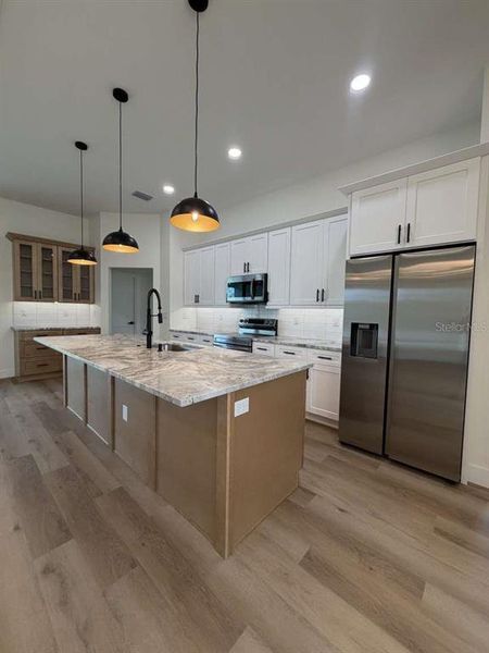 Furnished interior view inside a new home in , North Port (Image 8).