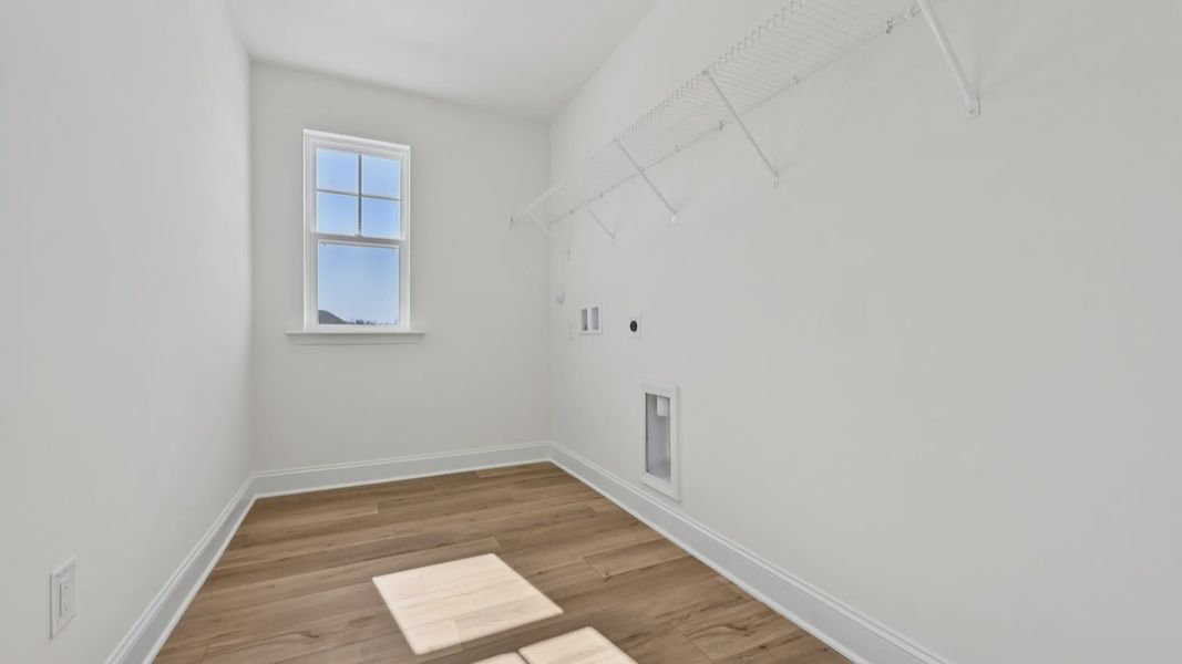 Furnished interior view inside a new home in Sidney Creek Single Family, Zebulon (Image 46).