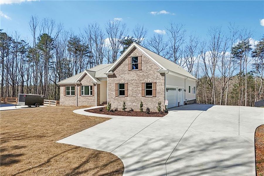 Front exterior of a new home in , Canton, GA, highlighting curb appeal (Image 35). Front exterior of a new home in , Canton, GA, highlighting curb appeal (Image 35).
