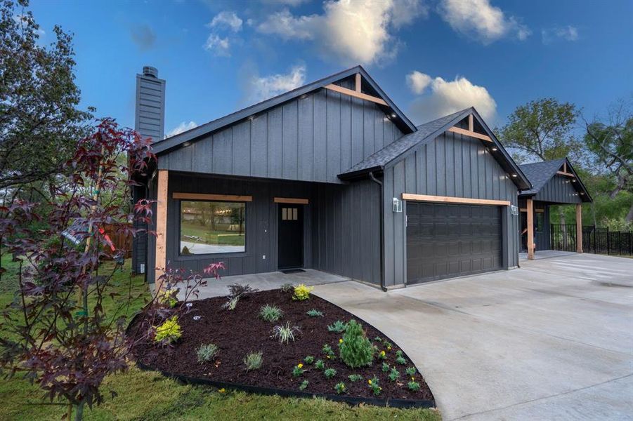 Modern farmhouse style home with a garage