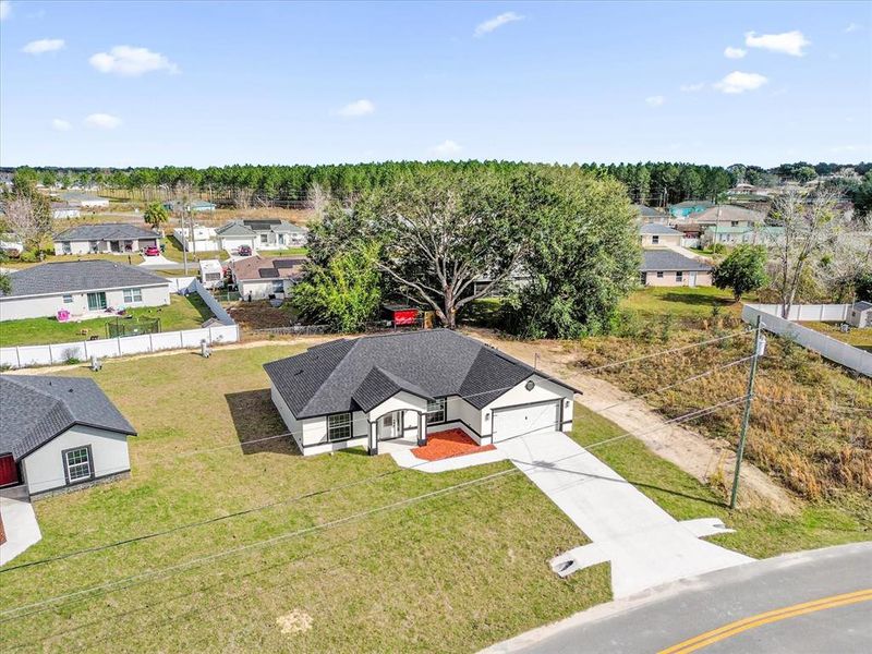 Front exterior of a new home in , Ocala, FL, highlighting curb appeal (Image 15). Front exterior of a new home in , Ocala, FL, highlighting curb appeal (Image 15).