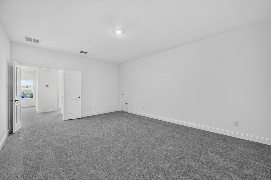 Spacious, unfurnished interior of a new home in The Ranch at Uptown Celina, Celina (Image 27).