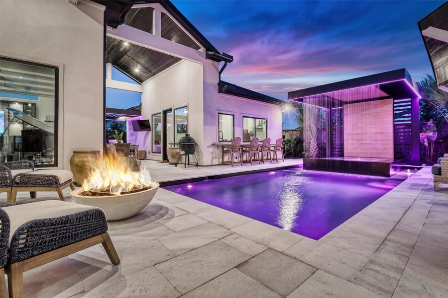 Imagine hosting parties here with friends and family! Lighting can be coordinated with music, and the sound of the waterfall over the spa is impressive.