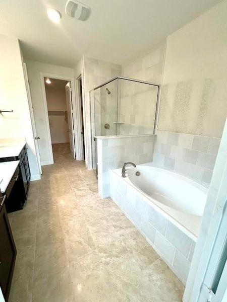 Primary Bath retreat with dual vanities & garden tub
