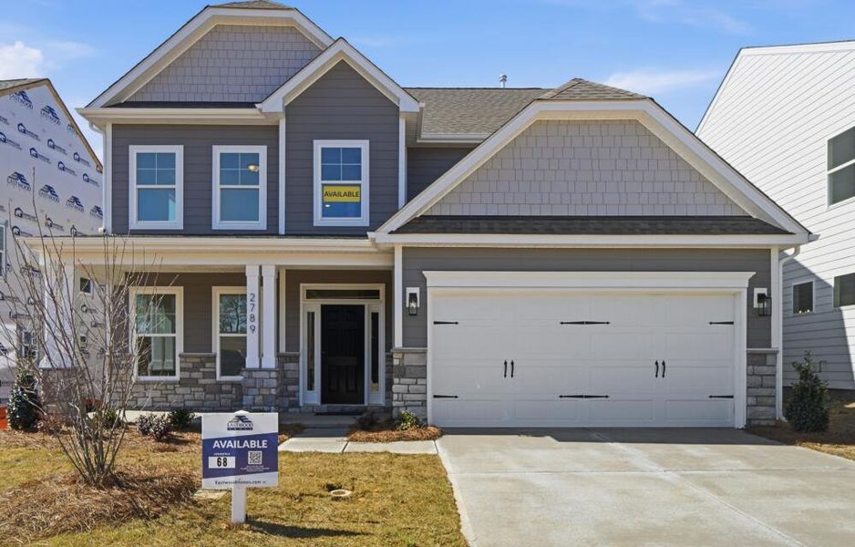 Front exterior of a new home in Ashton Park, Monroe, NC, highlighting curb appeal (Image 2). Front exterior of a new home in Ashton Park, Monroe, NC, highlighting curb appeal (Image 2).
