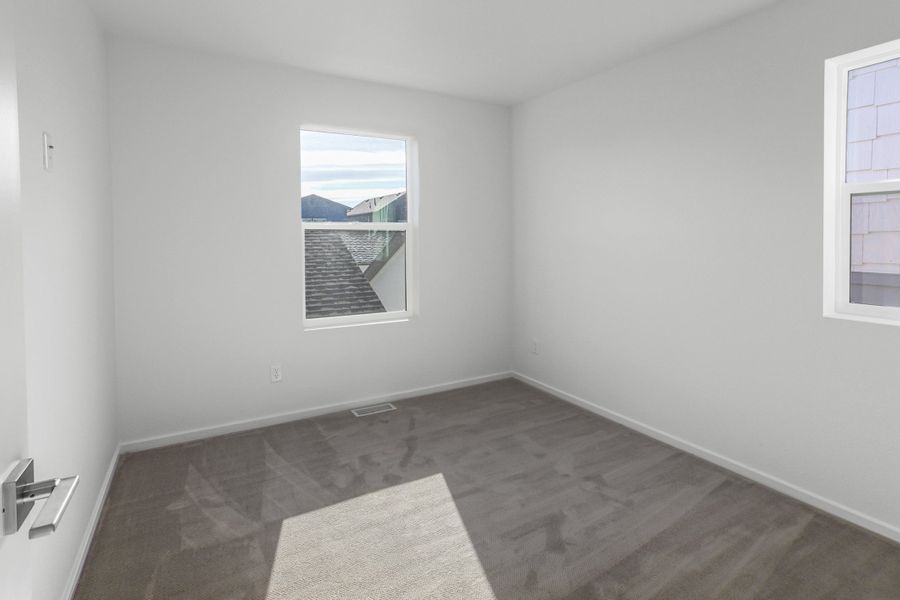 Spacious, unfurnished interior of a new home in Prairie Song, Windsor (Image 22).