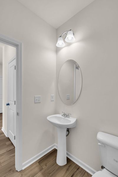 Downstairs powder room. Downstairs powder room.