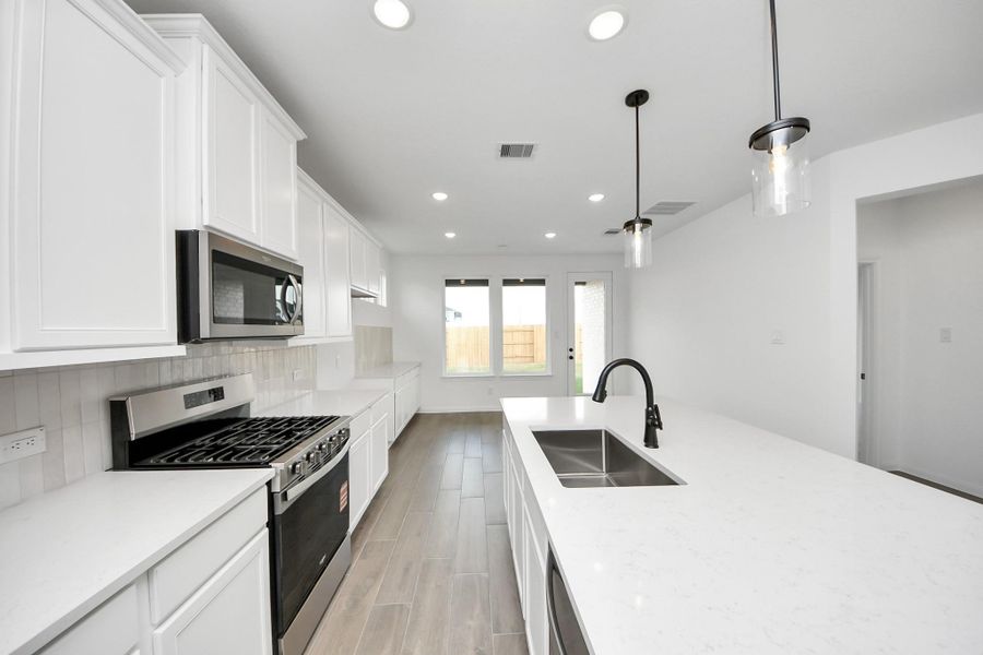 Furnished interior view inside a new home in Elyson, Katy (Image 6).
