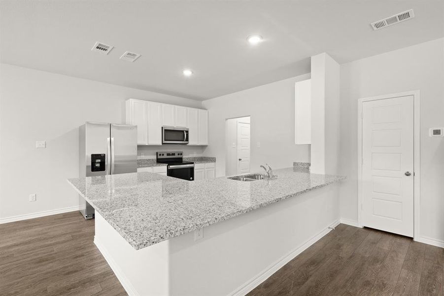 Furnished interior view inside a new home in Christian Meadows, Ennis (Image 8).