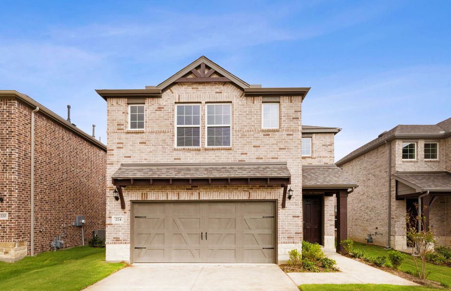 The Sienna, a two-story home with 2-car garage, shown with Home Exterior R