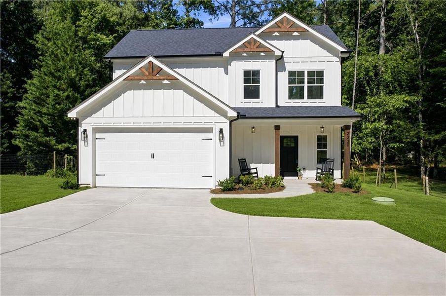 Front exterior of a new home in , Cumming, GA, highlighting curb appeal (Image 28).