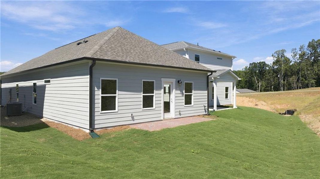 Exterior details and patio area of a home in The Bluffs, Canton (Image 3).