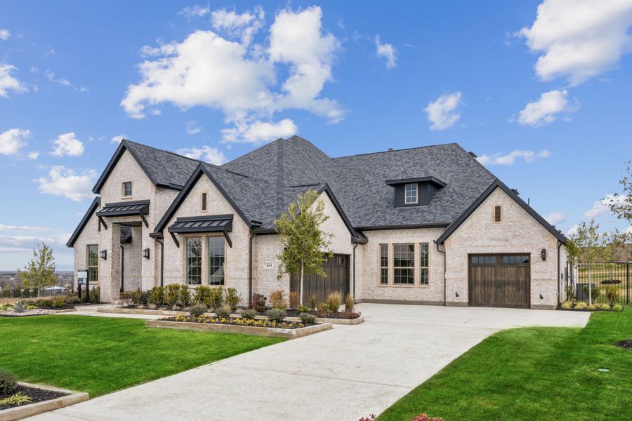 Front exterior of a new home in The Vines, Haslet, TX, highlighting curb appeal (Image 25). Front exterior of a new home in The Vines, Haslet, TX, highlighting curb appeal (Image 25).