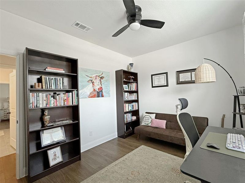 Office space with wood finished floors and ceiling fan Office space with wood finished floors and ceiling fan