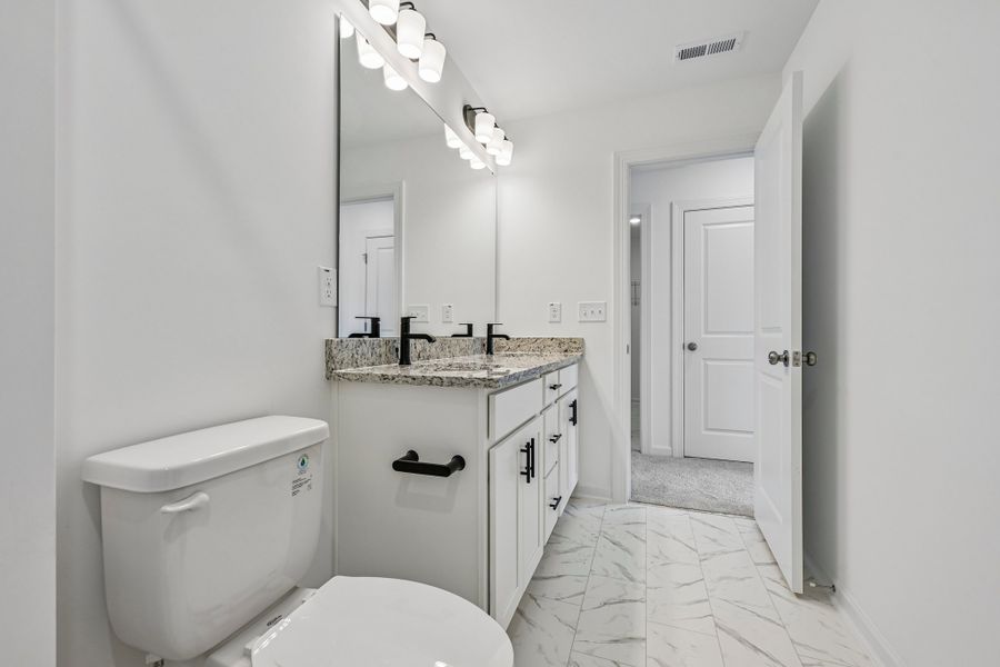Furnished interior view inside a new home in Forestville Station, Wake Forest (Image 10).