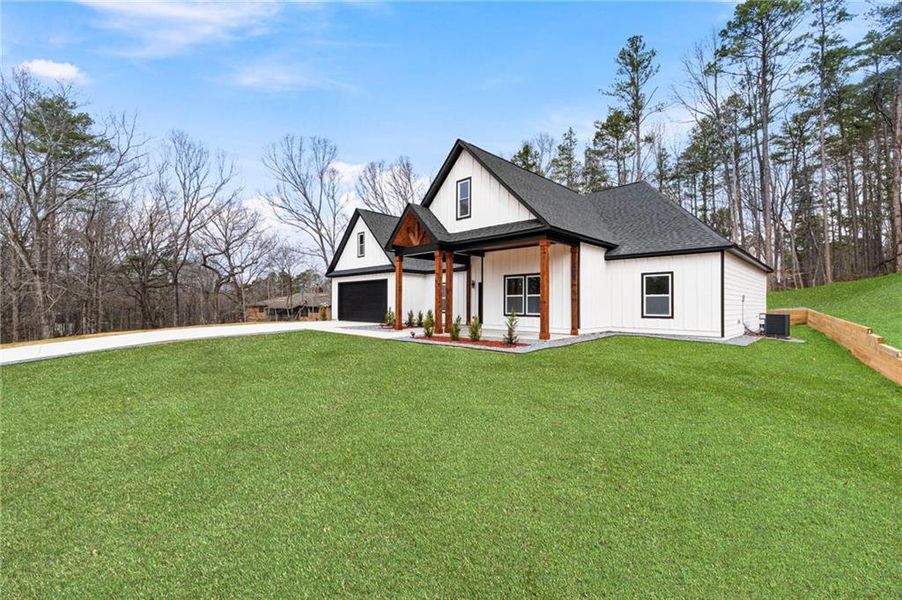 Front exterior of a new home in , Cartersville, GA, highlighting curb appeal (Image 25).