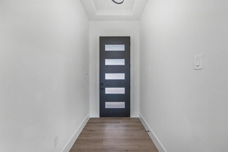 Entryway with light wood-type flooring