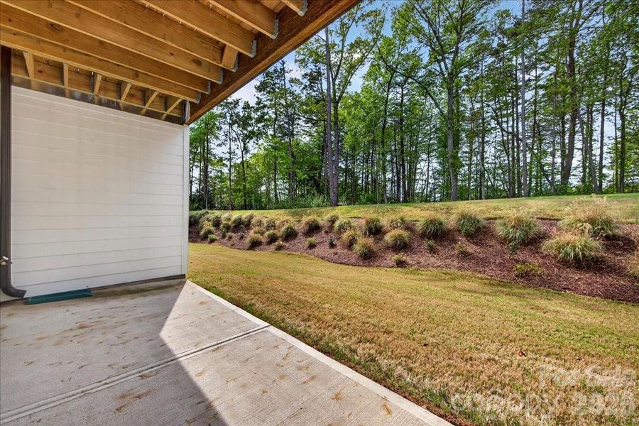 Private first floor outdoor living with tree views