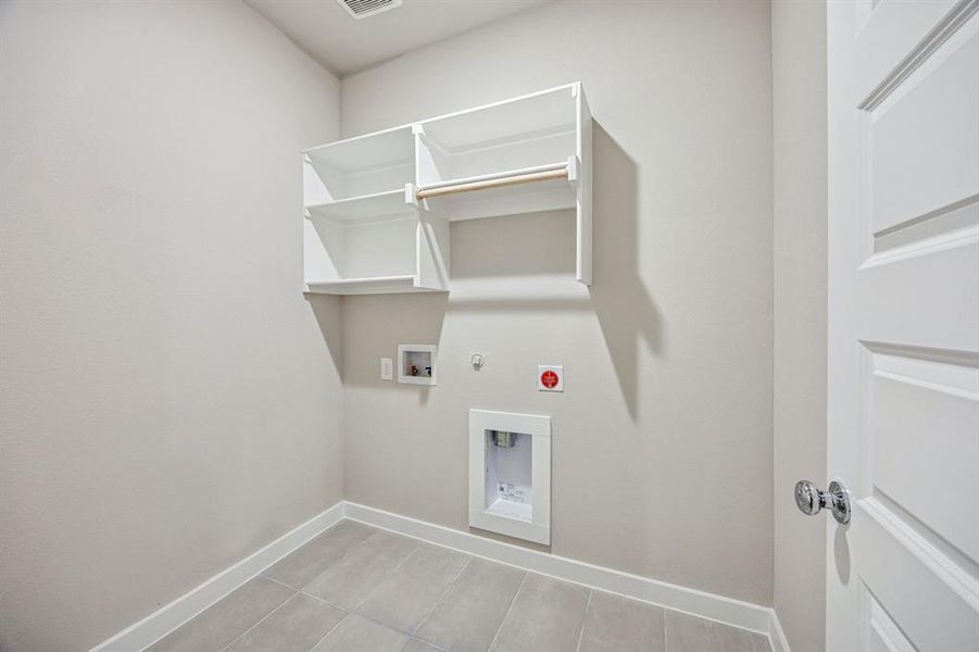 Utility Room in the Willow home plan by Trophy Signature Homes – REPRESENTATIVE PHOTO