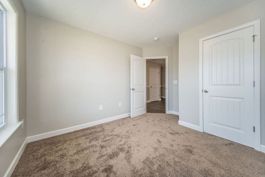 Representative unfurnished interior of a home built from the Bishop by Enchanted Homes in Ballentine Ridge, Lyman (Image 20).
