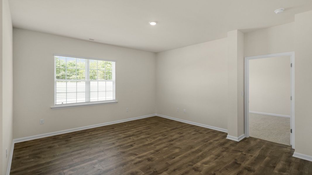Spacious, unfurnished interior of a new home in The Grove at Matthews Landing, Fuquay Varina (Image 12).