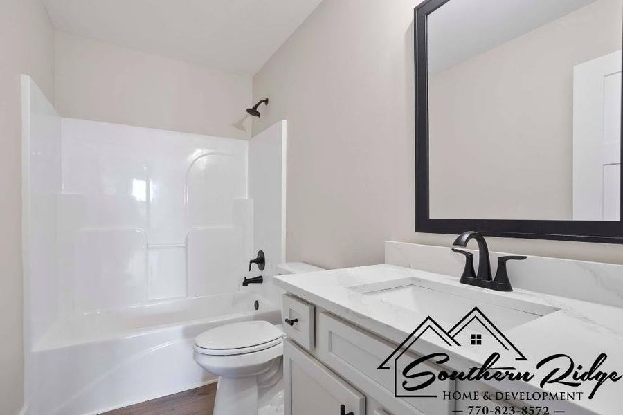 Furnished interior view inside a new home in , Roopville (Image 5).
