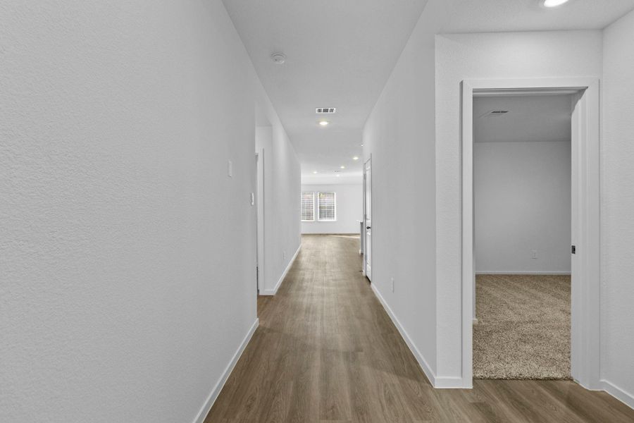 Spacious, unfurnished interior of a new home in Harrington Trails at The Canopies, Splendora (Image 11).