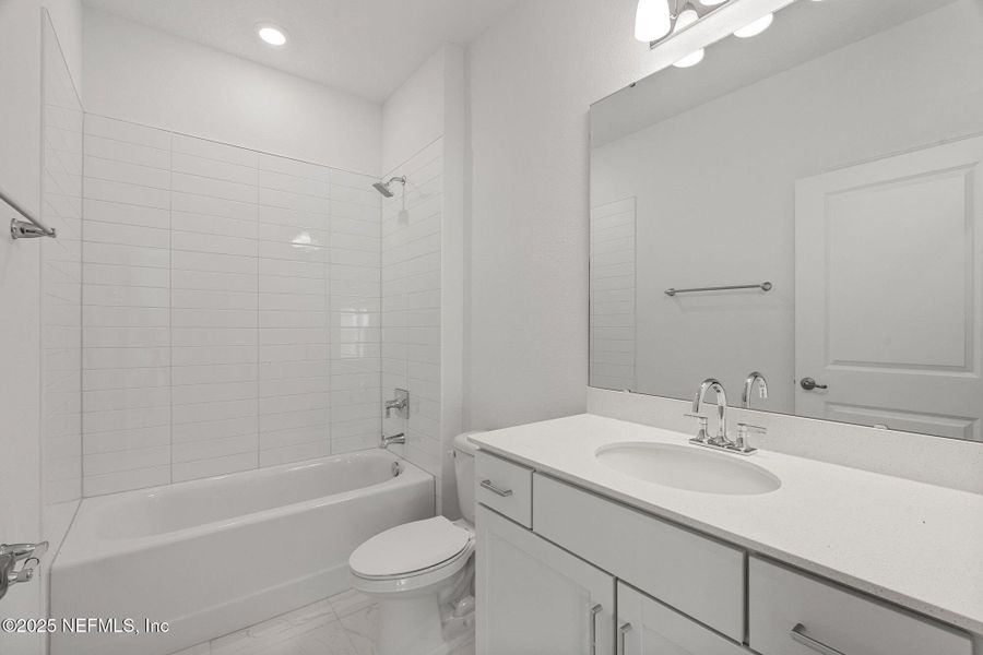 Furnished interior view inside a new home in Beacon Lake, St. Augustine (Image 12).