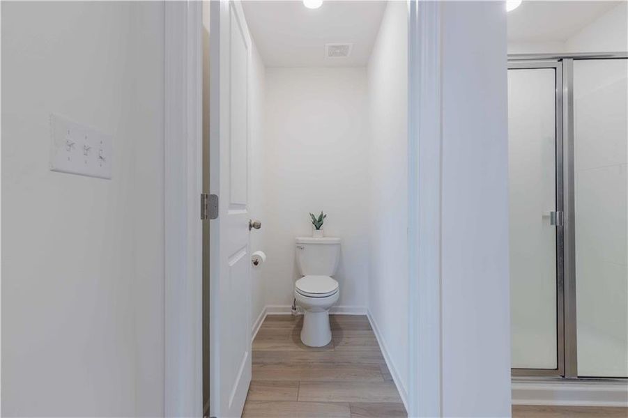 Furnished interior view inside a new home in Creekside at Farmers Crossing, Ball Ground (Image 18).