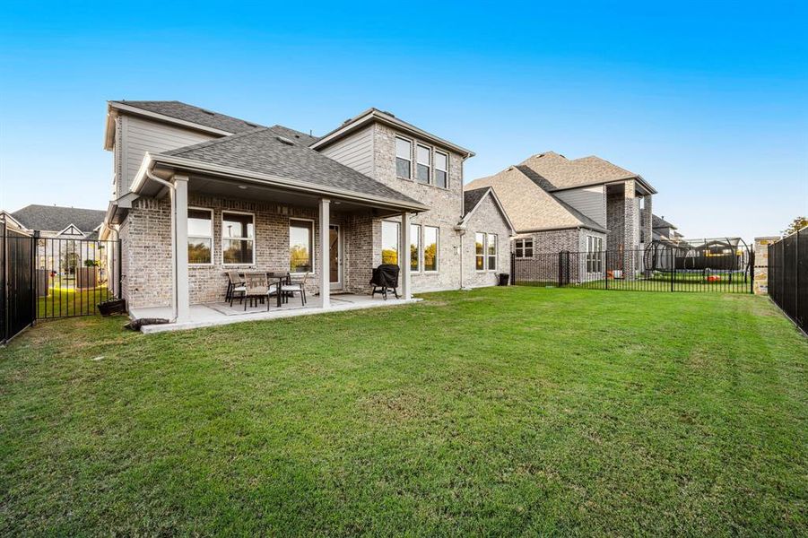 Great view of the yard and rear of the home. Great view of the yard and rear of the home.