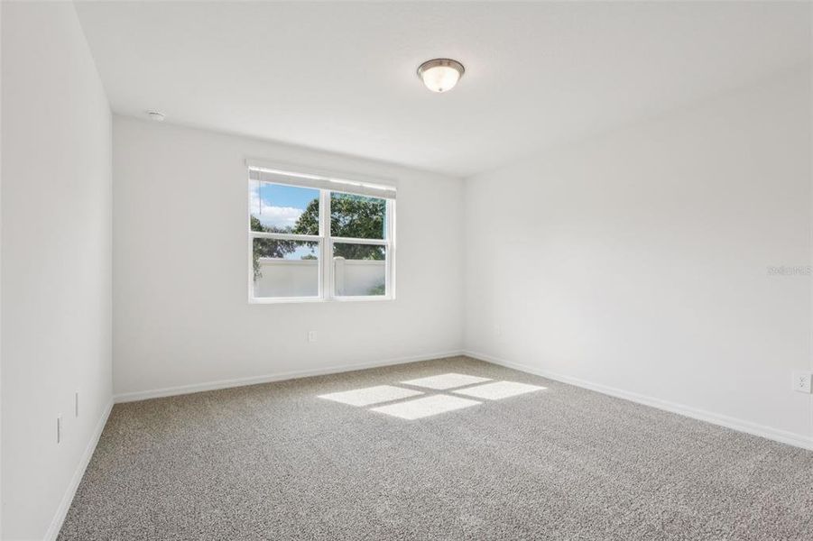 Spacious, unfurnished interior of a new home in Bradbury Creek - Signature Series, Haines City (Image 27).