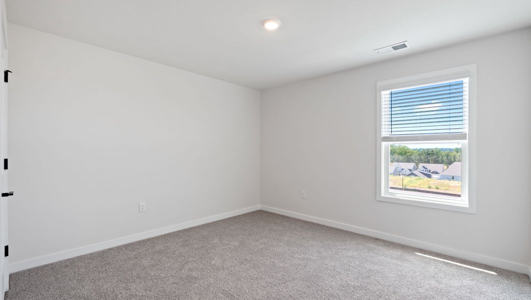 Spacious, unfurnished interior of a new home in Adams Glen, Greenville (Image 28).