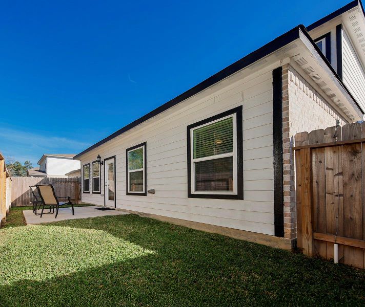Exterior details and patio area of a home in Lakes at Black Oak, Magnolia (Image 20). Exterior details and patio area of a home in Lakes at Black Oak, Magnolia (Image 20).