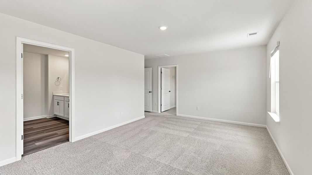 Spacious, unfurnished interior of a new home in Harrier Point, Woodruff (Image 38).